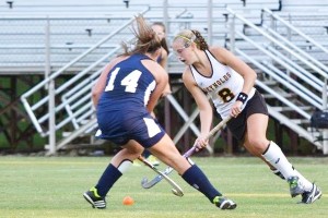 Senior Chandler Borton takes the ball down field to set up the Reynolds offense in a game earlier this season. The four-year varsity star has committed to play field hockey for Wake Forest next year. PHOTO PROVIDED BY MARGARET MORRISON