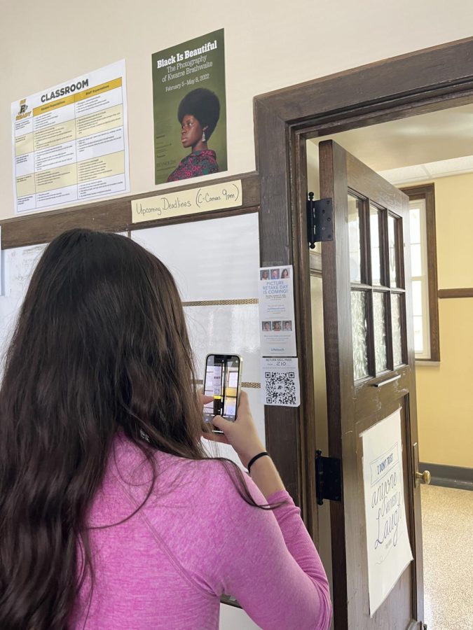 Photo provided by Lilly Zaks: After returning from the second-floor bathroom, sophomore Olivia Bland scans the “digital hall pass” QR code on her phone. 
