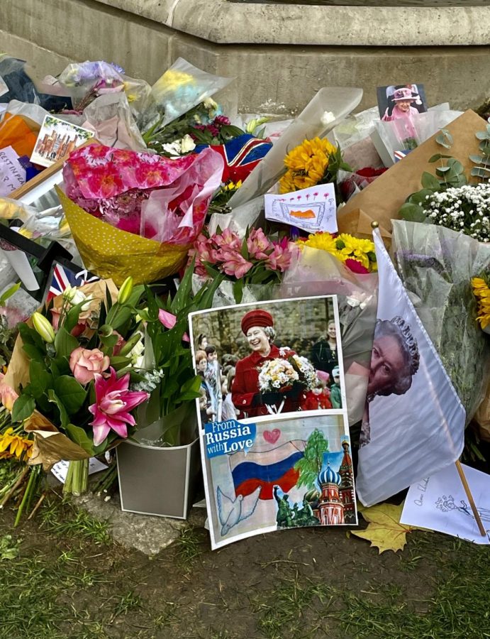 Photo Provided by Melissa Lewis - 







              Flowers gathered around Buckingham Palace in remorse of Queen Elizabeth II’s death.