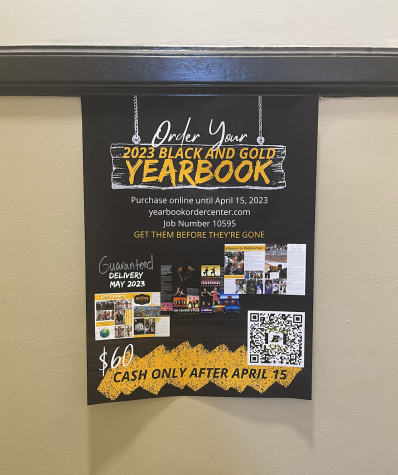 Flyers to order the 2023 yearbook hang in the halls!
