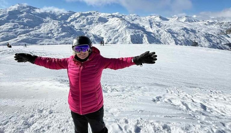 A patient walking in snowy mountains after CAR T-cell lupus treatment remission
